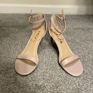 Gently worn strapped heel